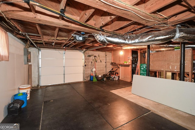 2780 Eastfield Rd SE, Smyrna, GA 30080 - garage with electric panel and a garage door opener