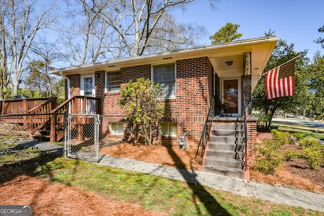 2780 Eastfield Rd SE, Smyrna, GA 30080 - view of front of home featuring a gate and brick siding
