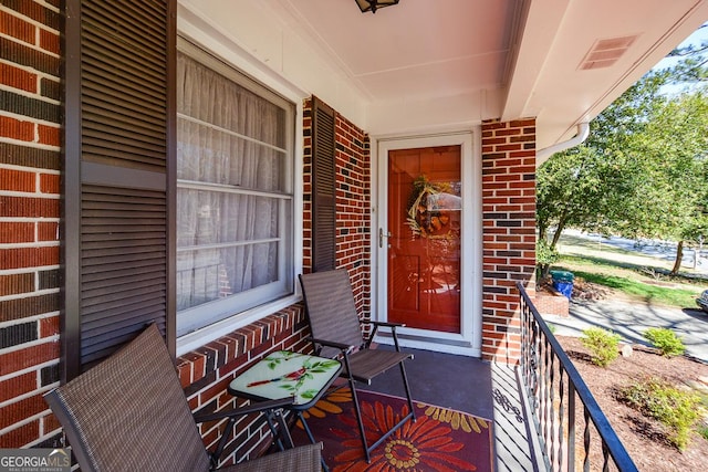 2780 Eastfield Rd SE, Smyrna, GA 30080 - property entrance featuring visible vents and brick siding