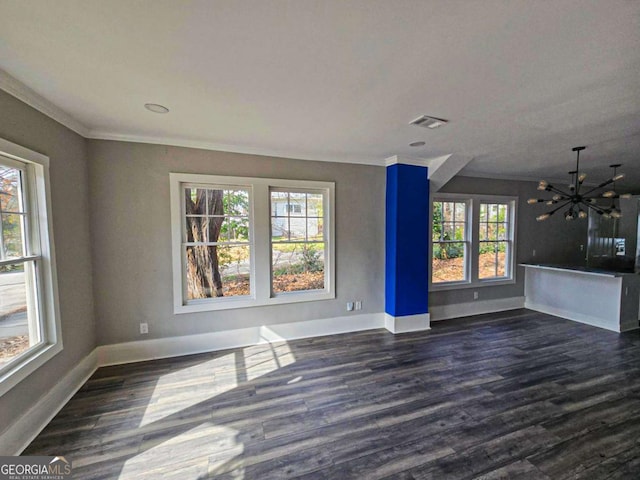 unfurnished living room with visible vents, baseboards, a chandelier, and dark wood-style flooring