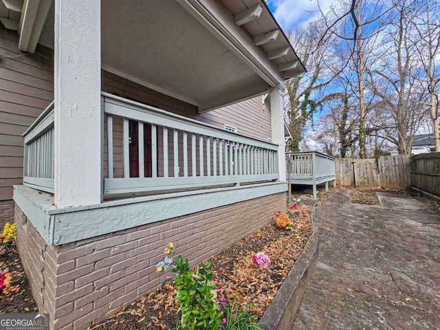 view of side of property with fence