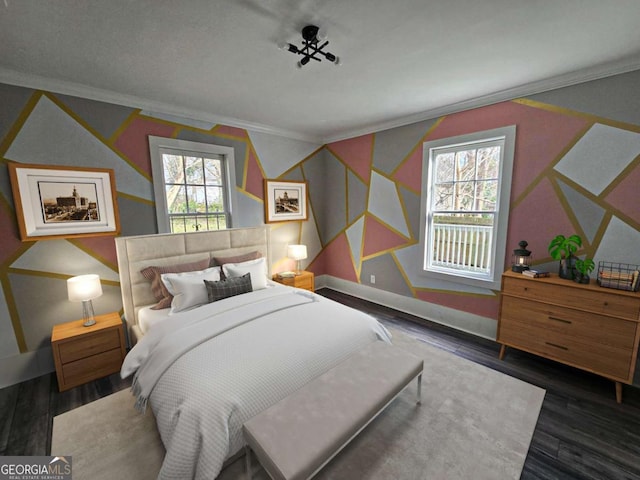 bedroom featuring wood finished floors, baseboards, and ornamental molding