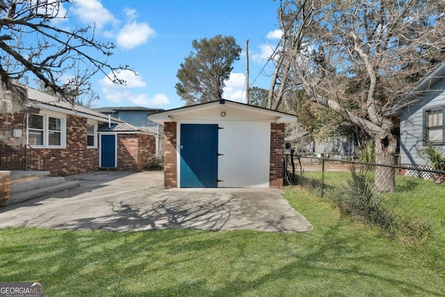 view of shed with fence