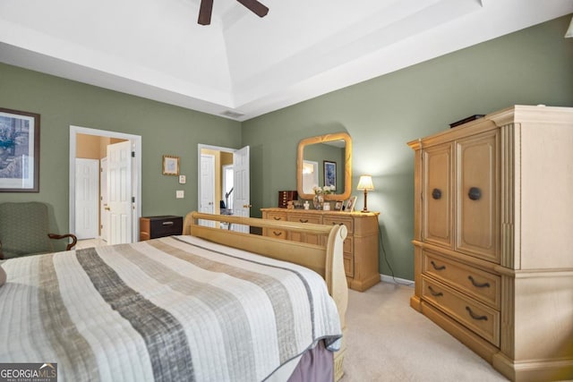 bedroom with visible vents, light carpet, and ceiling fan