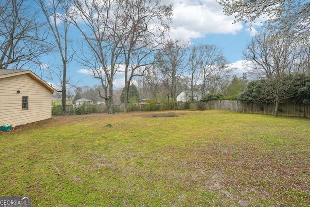 view of yard featuring a fenced backyard