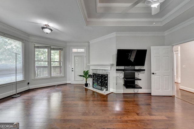 unfurnished living room featuring crown molding, a high end fireplace, and hardwood / wood-style flooring