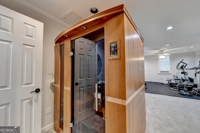 corridor featuring recessed lighting, carpet floors, and ornamental molding