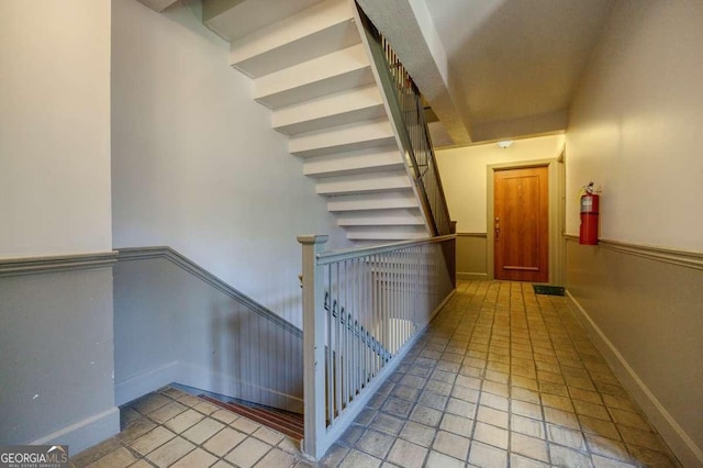 stairs with wainscoting