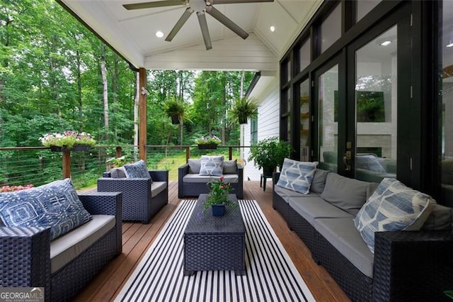 sunroom with vaulted ceiling and ceiling fan