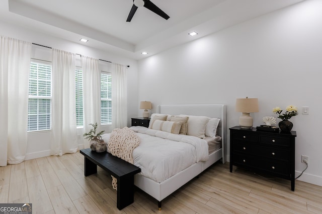 bedroom featuring recessed lighting, baseboards, ceiling fan, and light wood finished floors