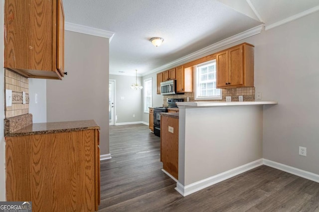 kitchen featuring stainless steel microwave, black / electric stove, dark wood-type flooring, and ornamental molding