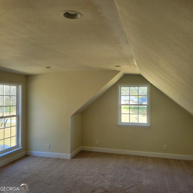 rear view of property featuring french doors, ceiling fan, and a patio area