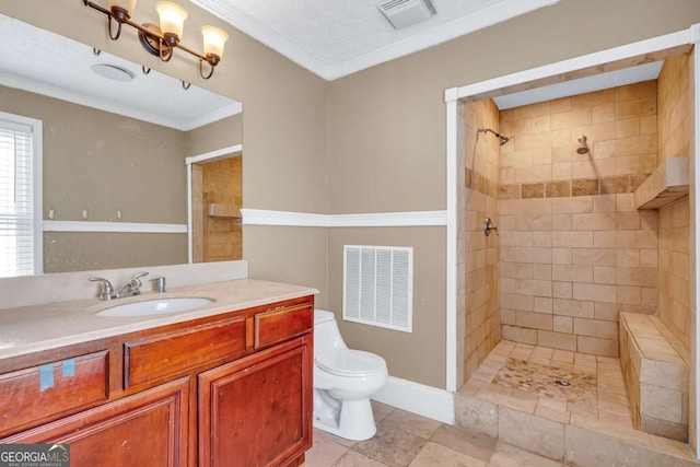 full bath featuring crown molding, toilet, visible vents, and a tile shower