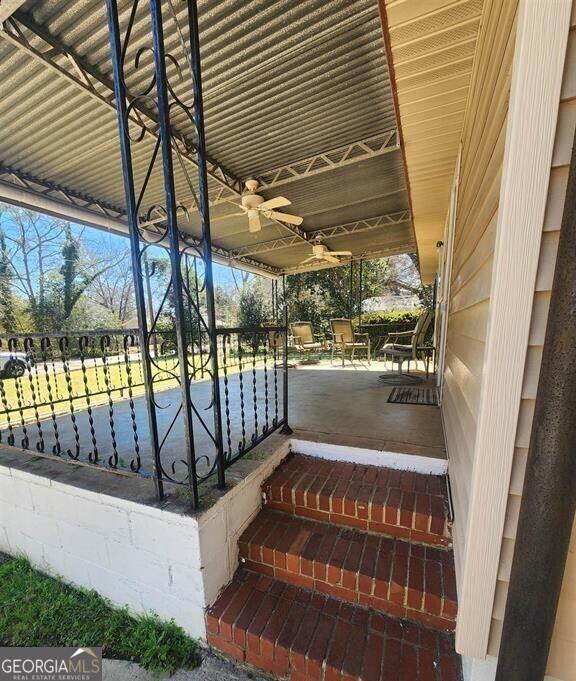 view of patio / terrace with a ceiling fan