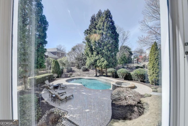 pool featuring a patio