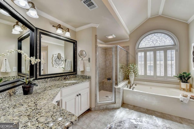 bathroom with a bath, visible vents, a stall shower, and ornamental molding