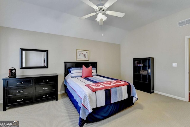 bedroom with visible vents, baseboards, lofted ceiling, light carpet, and a ceiling fan