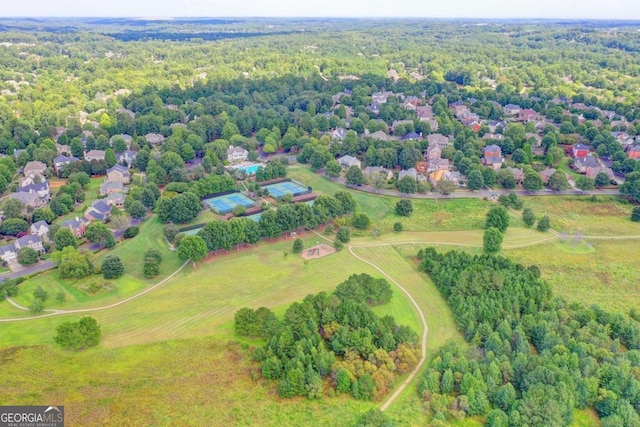 bird's eye view featuring a forest view