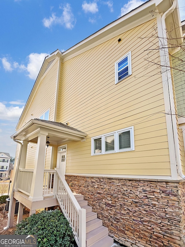 view of front of property with stone siding