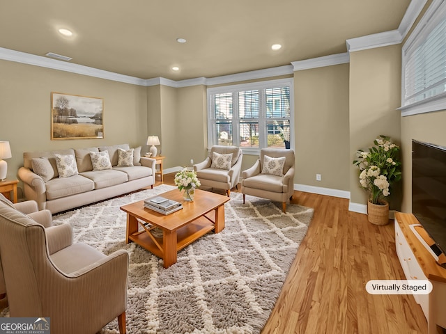 living area with recessed lighting, crown molding, baseboards, and wood finished floors