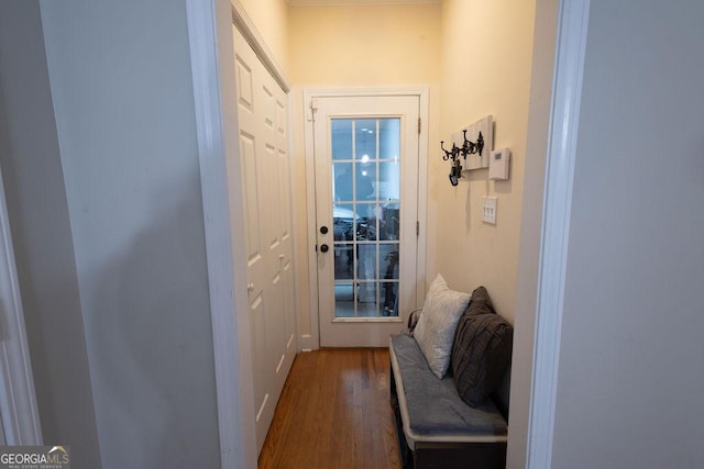 doorway with wood finished floors