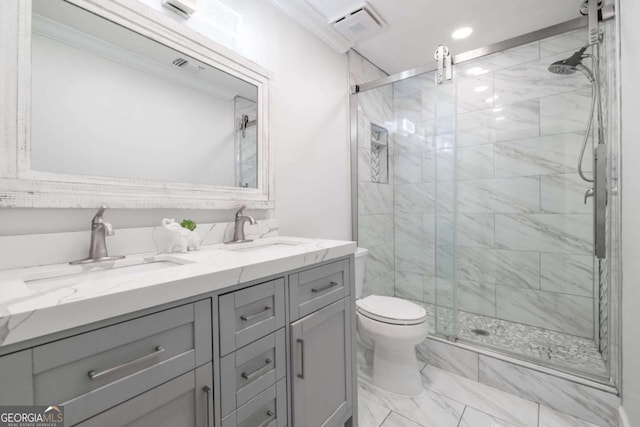 bathroom featuring a sink, marble finish floor, and a stall shower