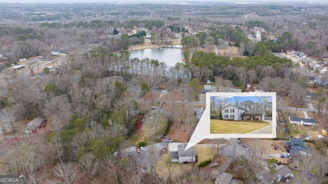 drone / aerial view featuring a water view