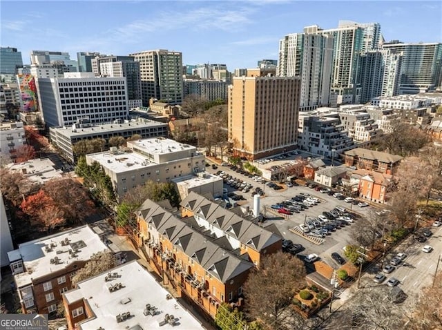 birds eye view of property featuring a view of city