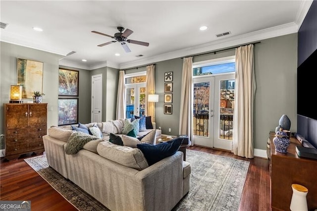 interior space with visible vents, ornamental molding, recessed lighting, french doors, and dark wood-style flooring