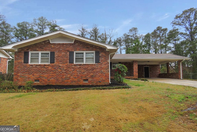 view of front facade with crawl space, driveway, a front yard, and brick siding