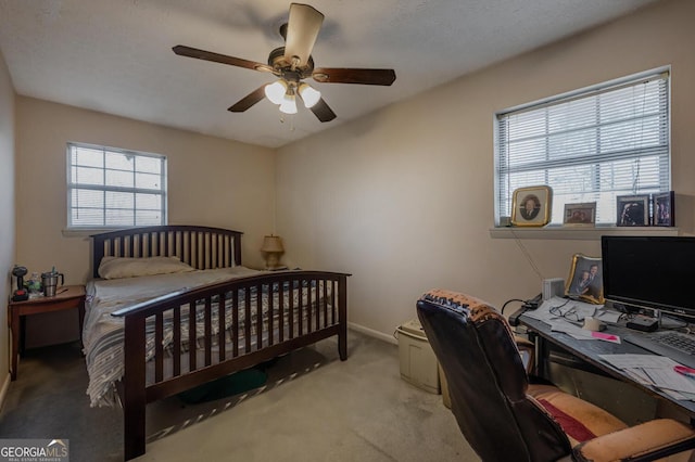 bedroom with baseboards, a ceiling fan, and carpet floors