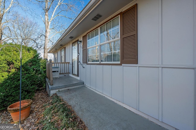 view of side of property with board and batten siding