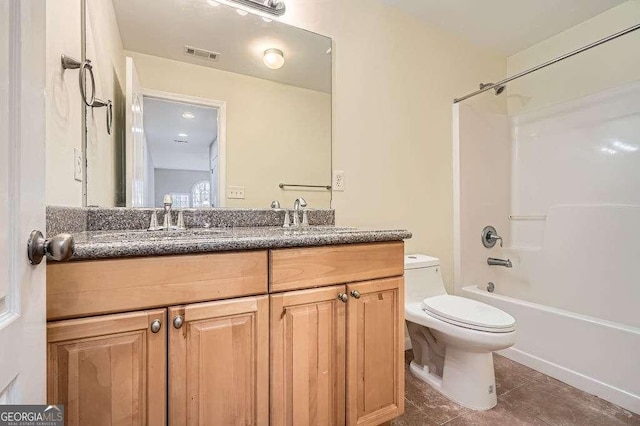 bathroom with visible vents, toilet, shower / washtub combination, tile patterned flooring, and vanity