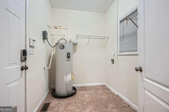 utilities featuring visible vents and water heater