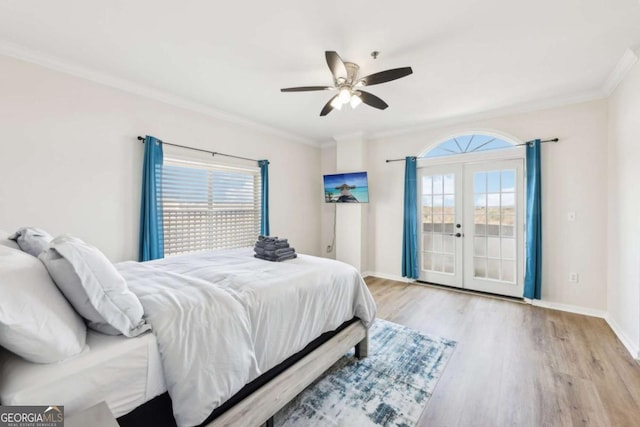 bedroom featuring ornamental molding, access to outside, wood finished floors, french doors, and baseboards