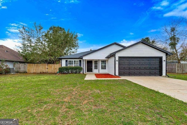 ranch-style home with a front lawn, fence, concrete driveway, central AC unit, and a garage