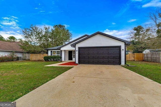 ranch-style house with a garage, driveway, a front yard, and fence