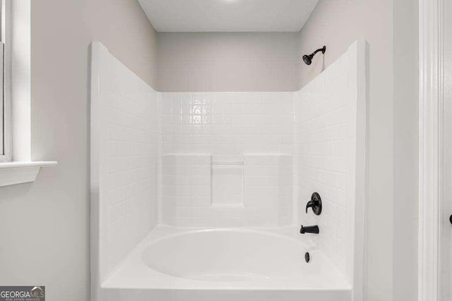 bathroom with shower / bathtub combination