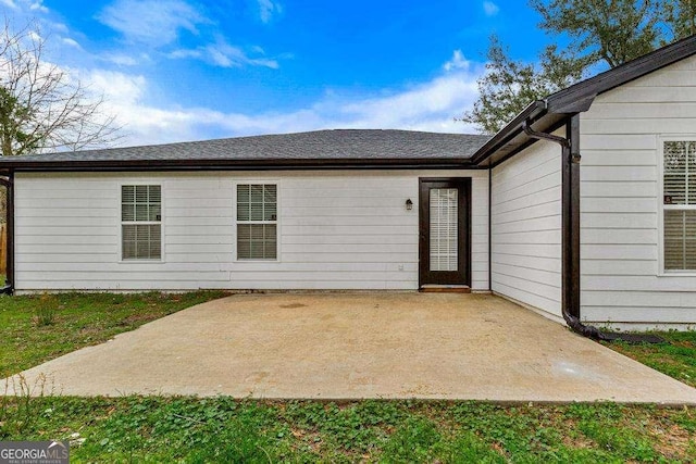 back of house featuring a patio area