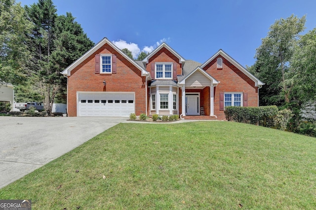 traditional home featuring brick siding, a garage, driveway, and a front yard