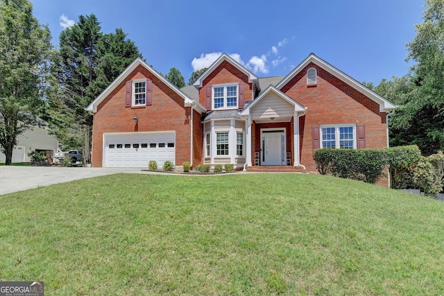 traditional home with brick siding, a garage, concrete driveway, and a front yard