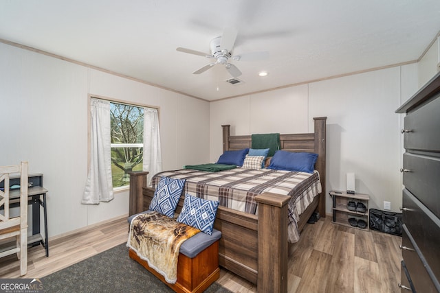 4159 Folks Dr, Blackshear, GA 31516 - bedroom featuring crown molding, visible vents, light wood finished floors, and ceiling fan