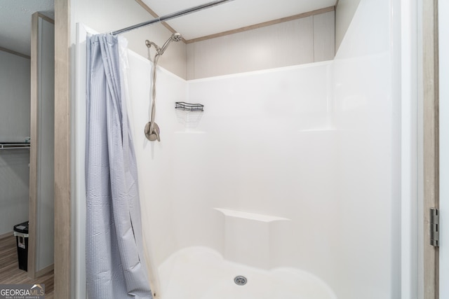 4159 Folks Dr, Blackshear, GA 31516 - bathroom with wood finished floors and a shower stall