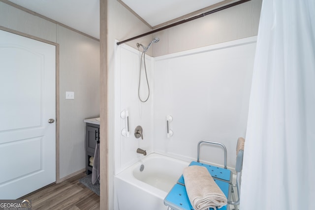 4159 Folks Dr, Blackshear, GA 31516 - bathroom featuring vanity, wood finished floors, shower / tub combo, and crown molding