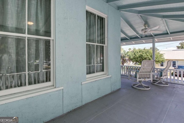 view of patio / terrace featuring a porch and a ceiling fan