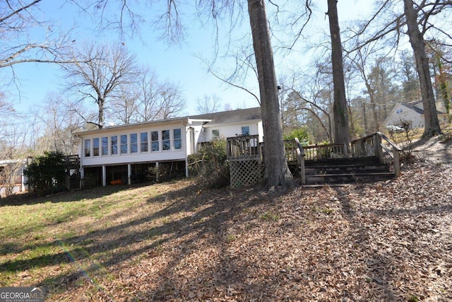 160 Cold Branch Rd, Eatonton, GA 31024 - back of house featuring a sunroom and a deck