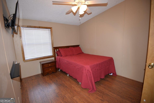 160 Cold Branch Rd, Eatonton, GA 31024 - bedroom featuring wood finished floors, a textured ceiling, ceiling fan, and vaulted ceiling