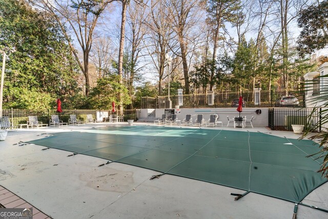 3203 Lenox Rd NE Unit 1, Atlanta, GA 30324 - pool featuring a patio area and fence