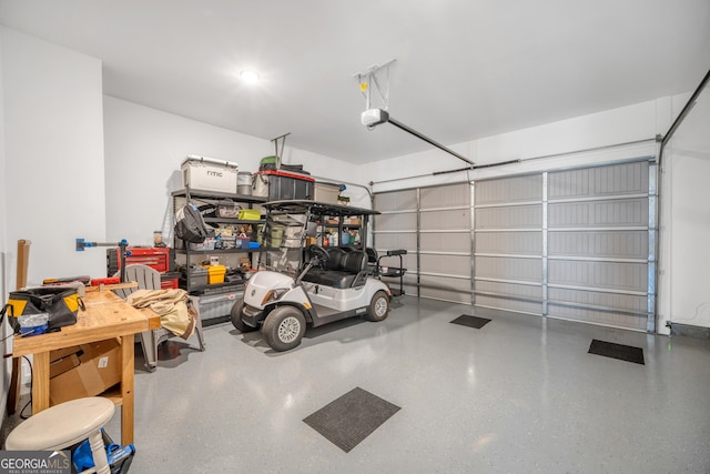 garage featuring a garage door opener