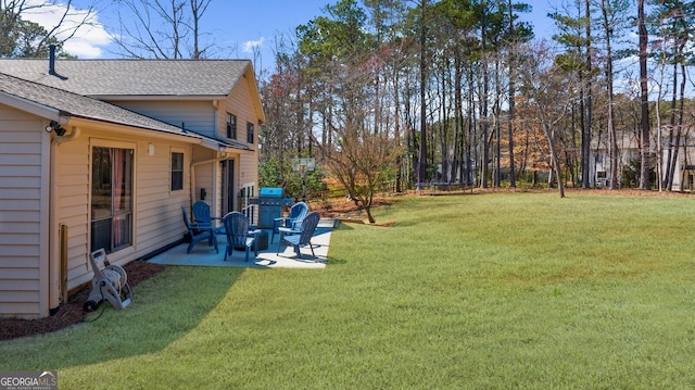 view of yard with a patio and a trampoline